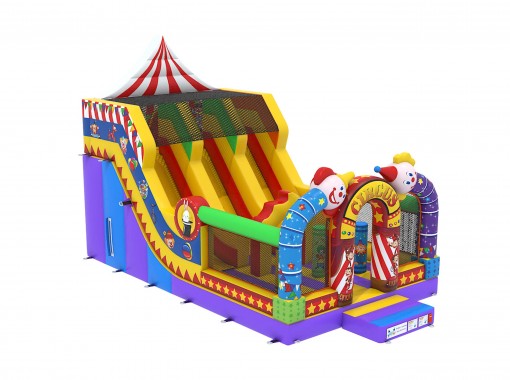 Te koop: groot circus springkasteel met dubbele glijbaan.